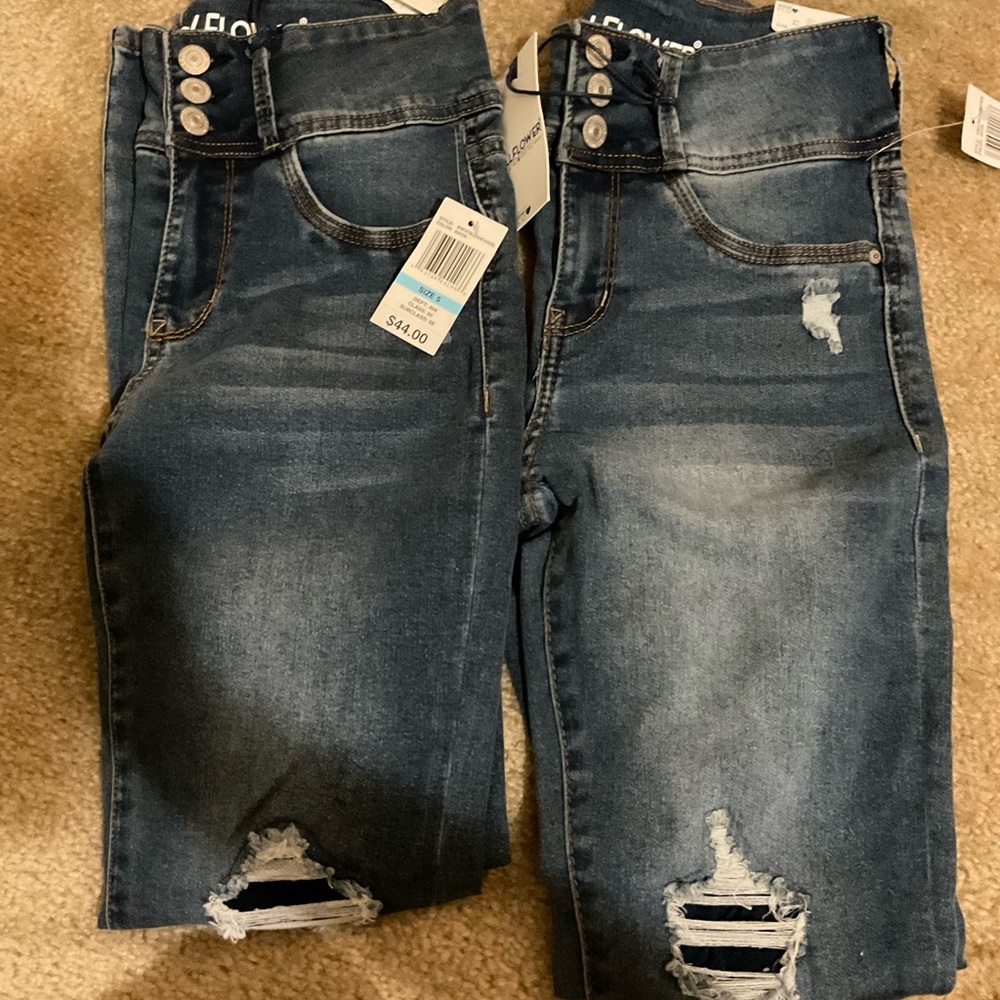 Distressed Blue Denim Jeans
